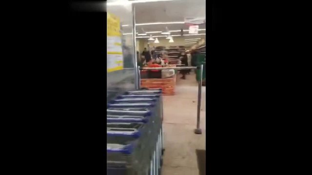 Man Destroying Grocery Checkout with Axe for Not Serving His Maskless Wife