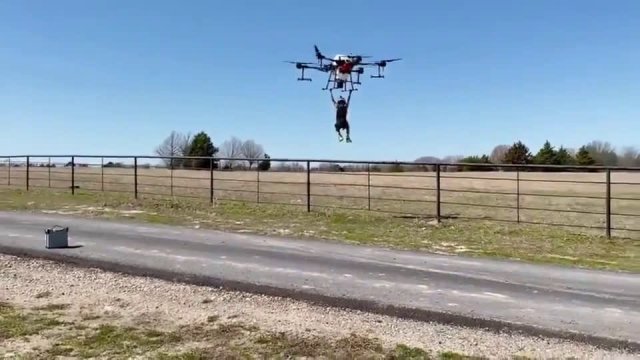 Uninspired dad tests heavy-lift drone using kid as cargo