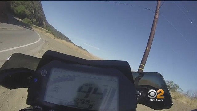 Motorcyclist flies off cliff, lives to tell about it