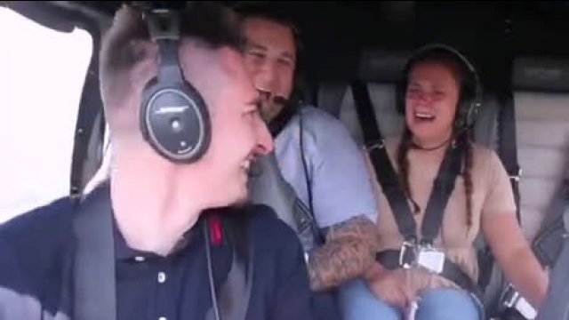 A helicopter pilot pretends to lose consciousness in flight